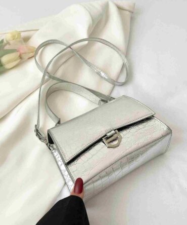 Bolso de color metálico con botón (sg2204092324836832)