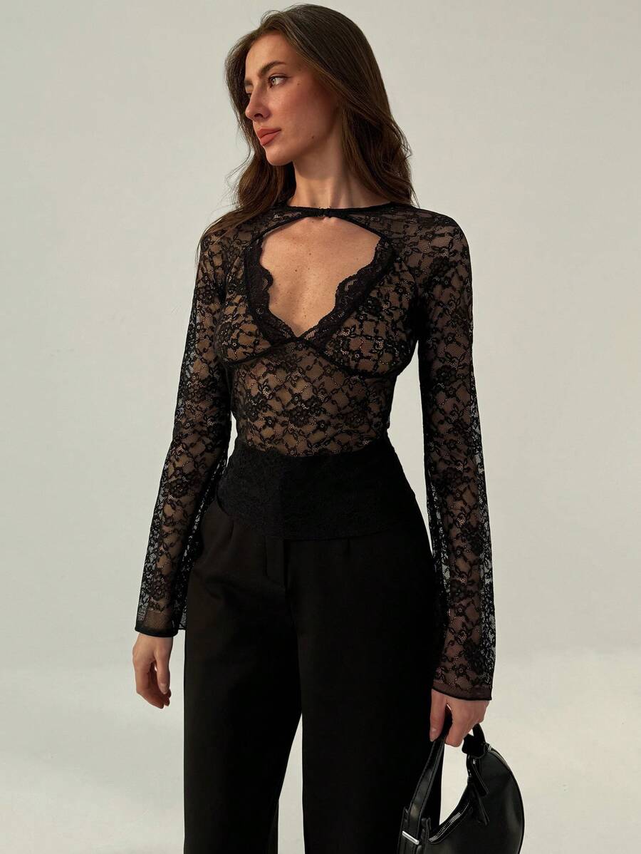Top de encaje con mangas en color negro (sz2409193334151185)